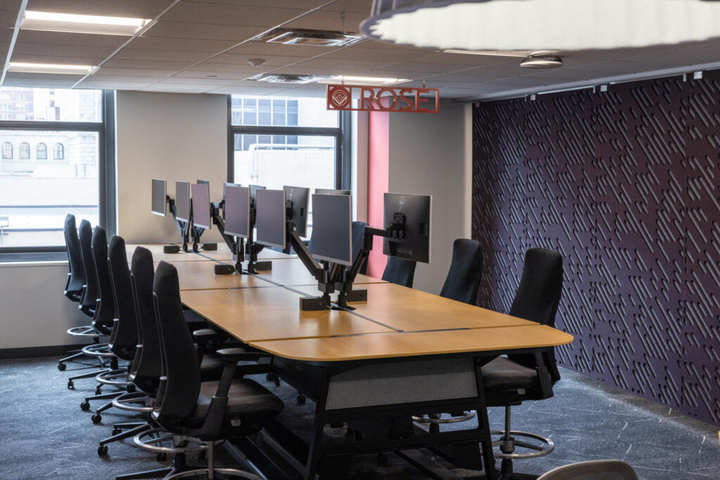 Great American Insurance Group collaboration spaces utilizes dual monitors for increased efficiency