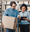 Woman and Man discuss inventory list