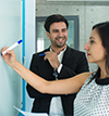 White Board discussion between boss and employee